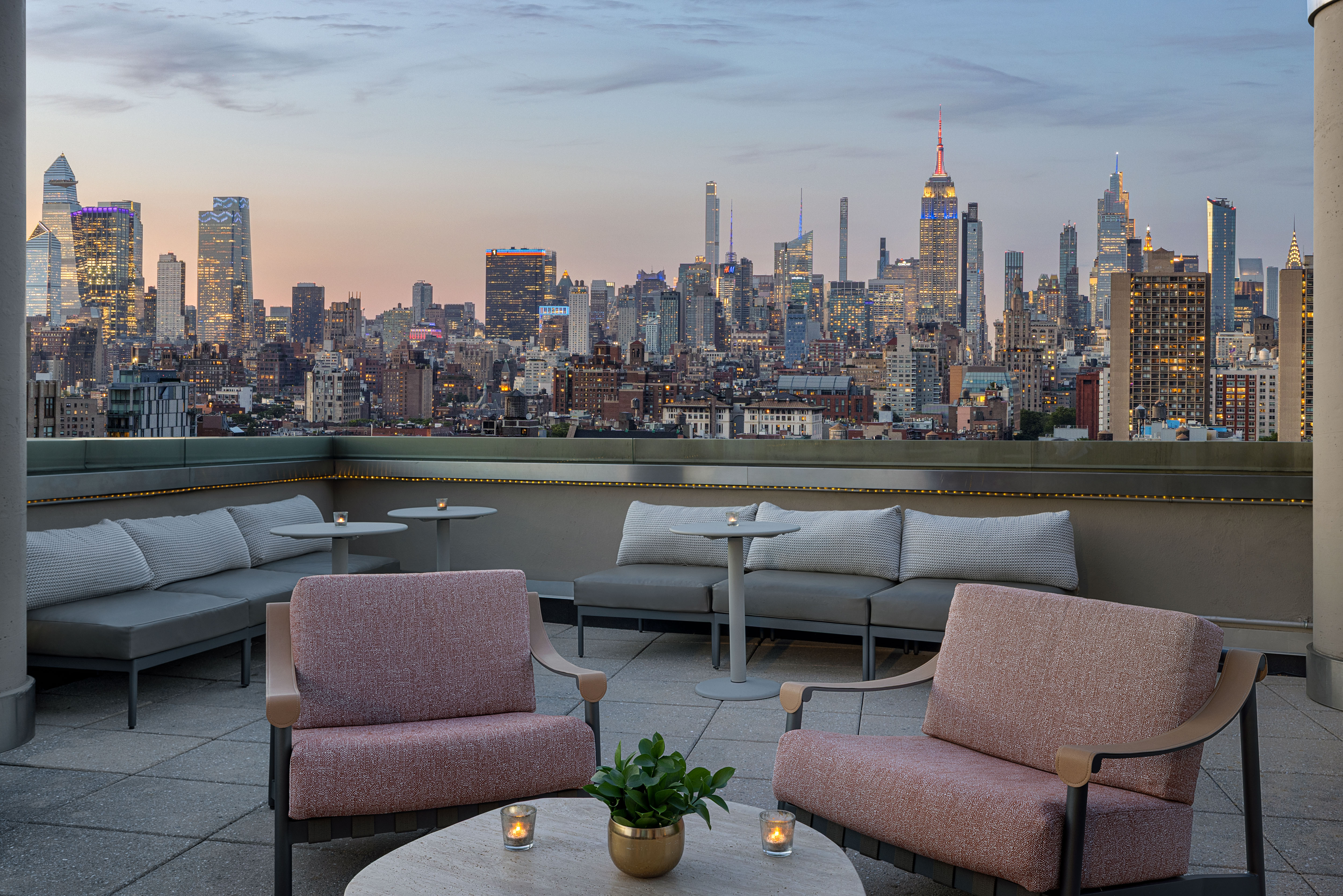 Evening terrace seating with Empire State Building skyline views at Sheraton Tribeca